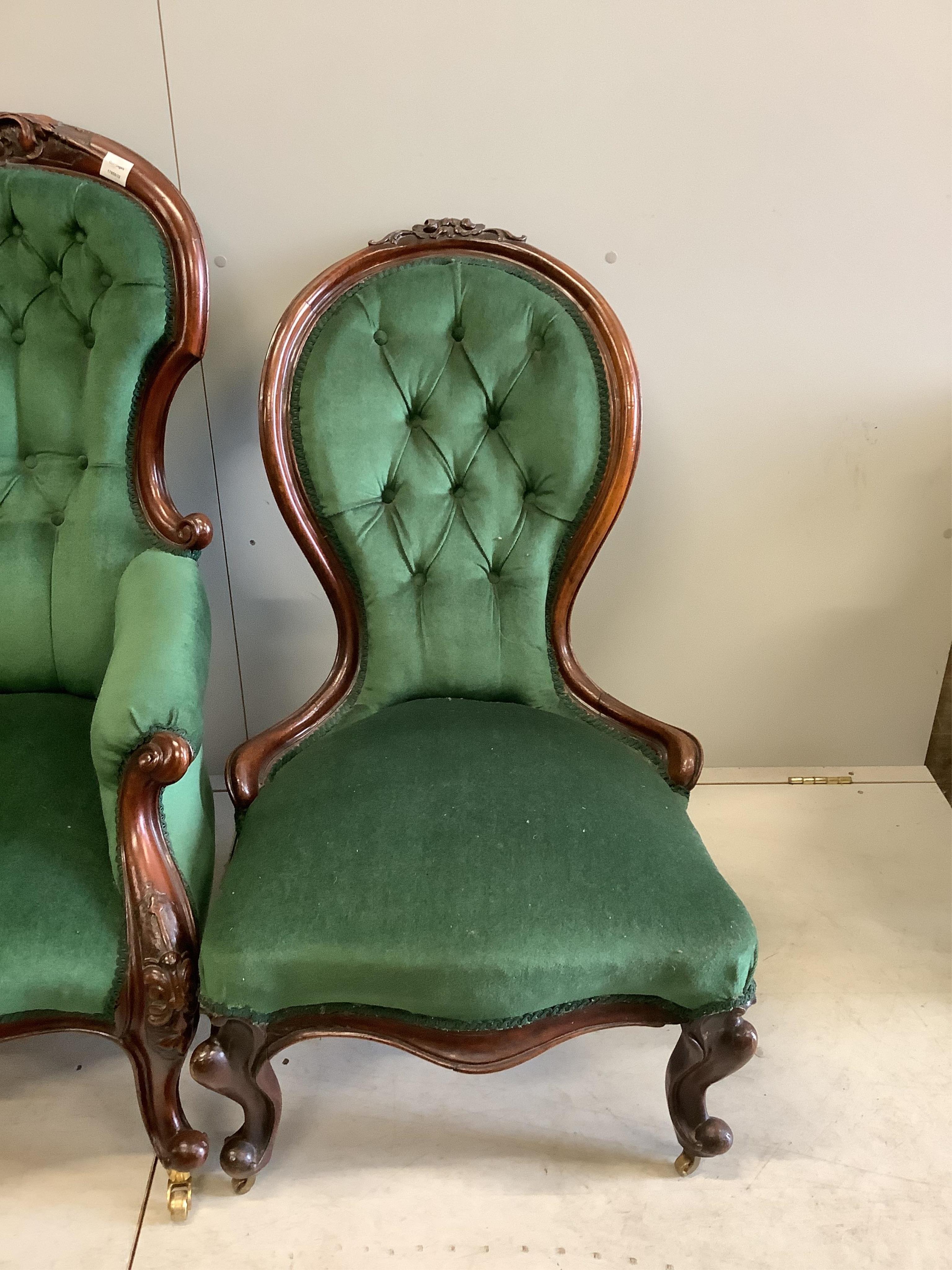 Four Victorian upholstered mahogany spoon back chairs, largest height 110cm. Condition - fair to good